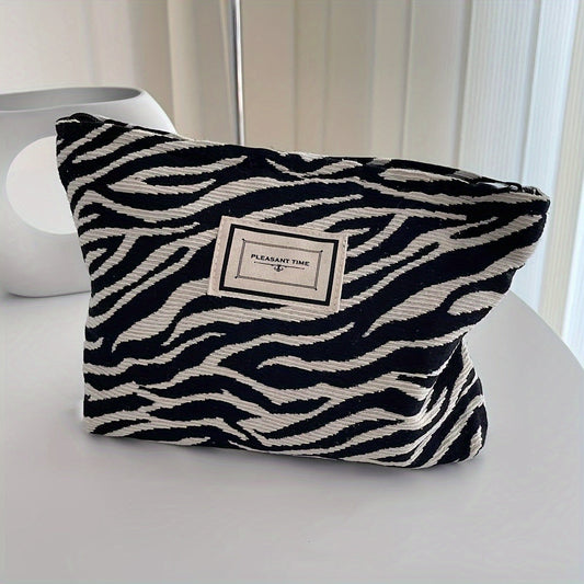 Elowen - Opvallende toilettas met zebraprint voor dames clutch & organizer